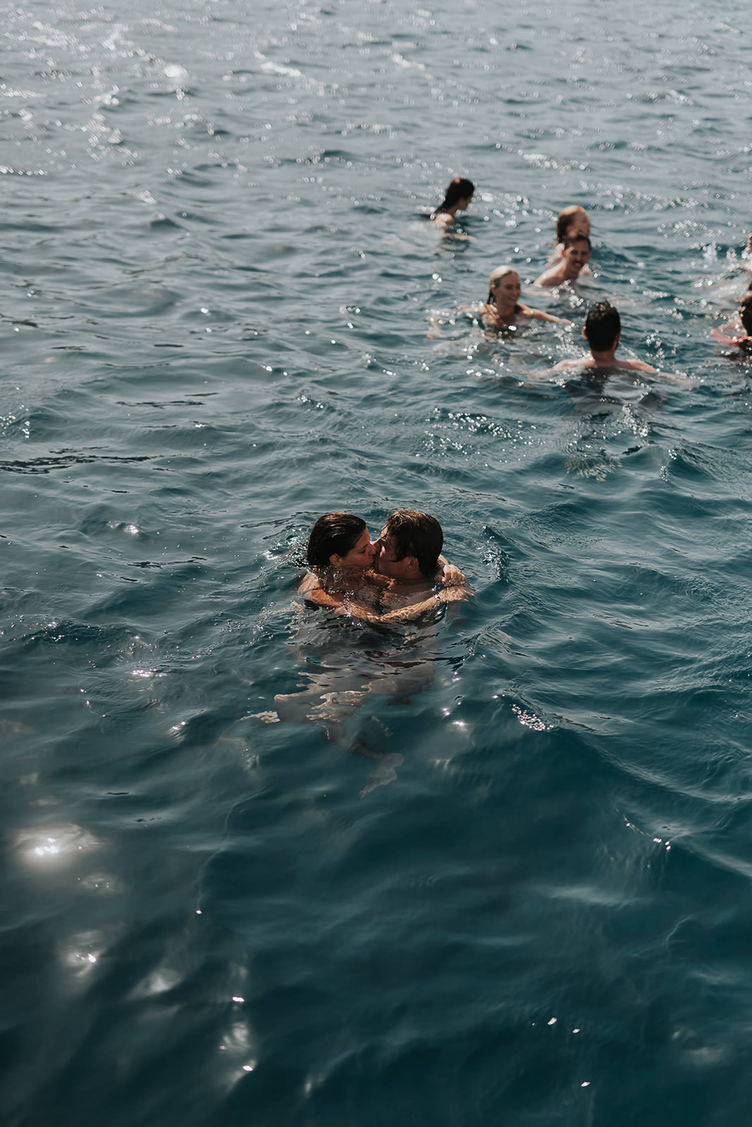 couple on pre wedding boat trip in mykonos